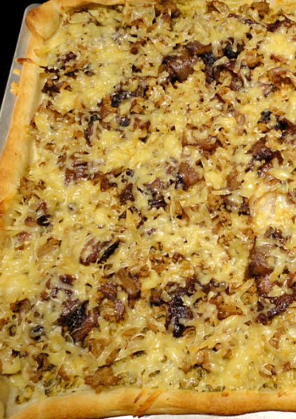 Sausage Caramelized Onions Smoked Gouda Pizza is an easy homemade pizza that's perfect for an easy weeknight dinner or a pizza party!