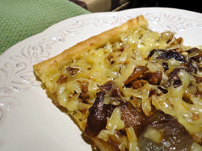 Sausage Caramelized Onions Smoked Gouda Pizza is an easy homemade pizza that's perfect for an easy weeknight dinner or a pizza party!